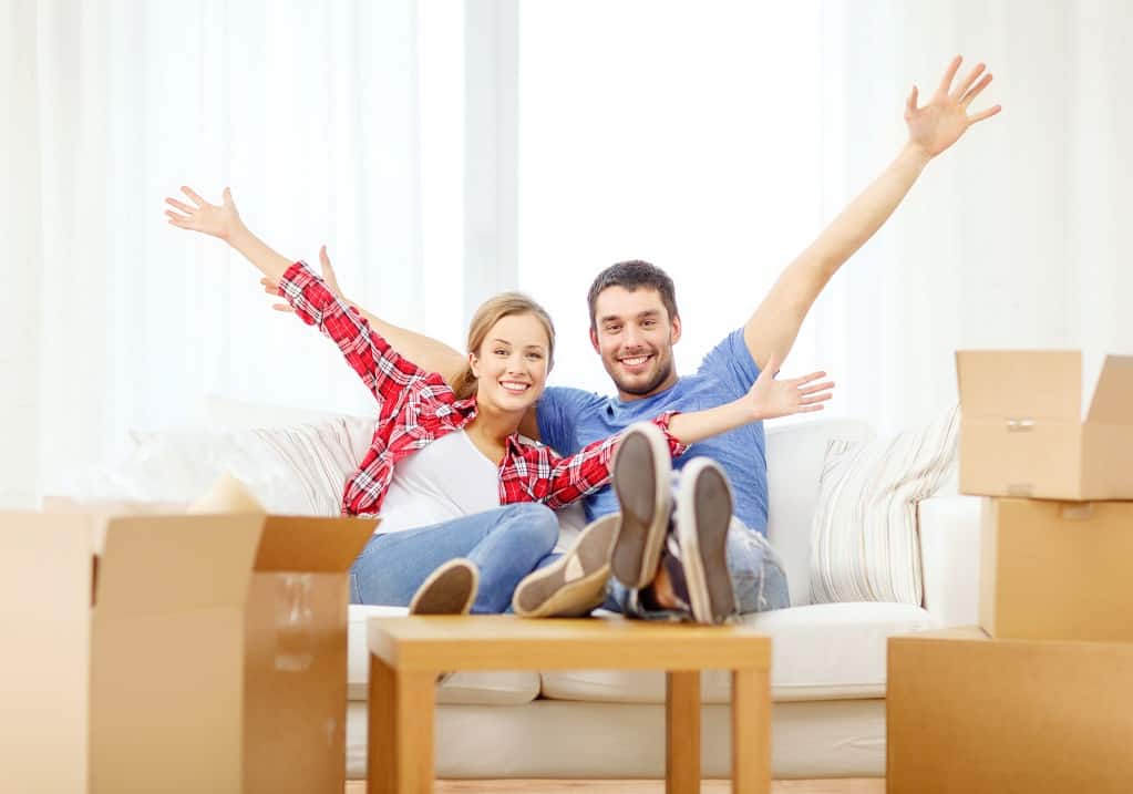 Happy Couple With Their New Home